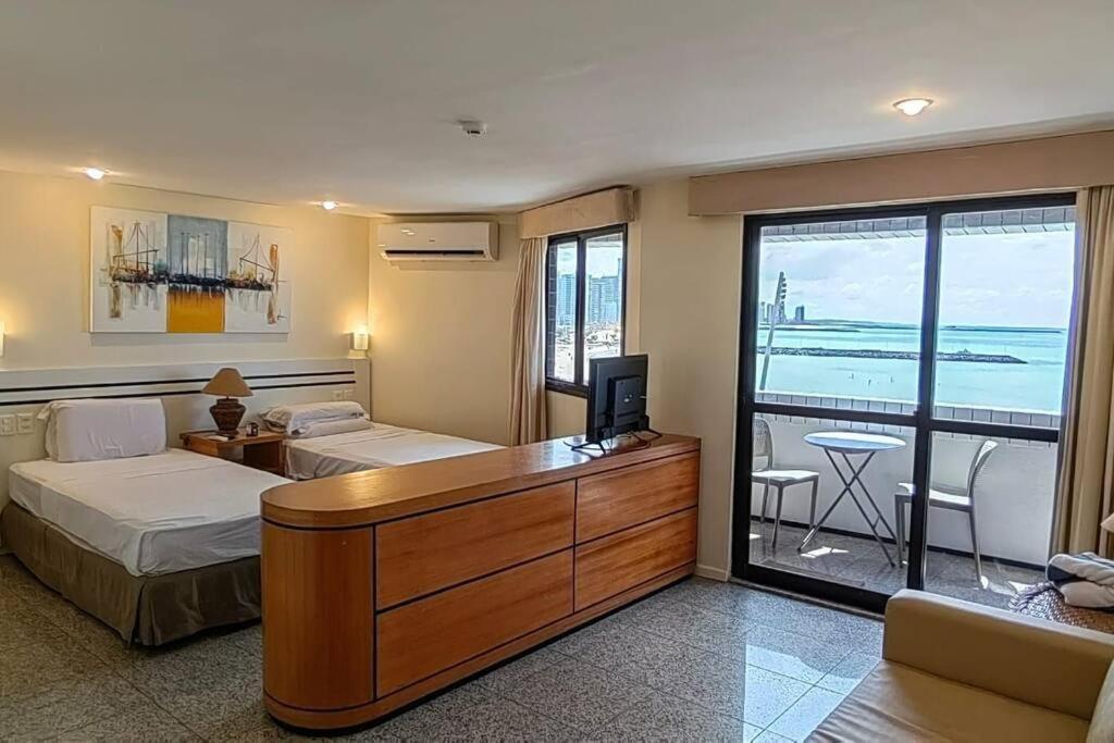 Flat No Da Beira-mar De *